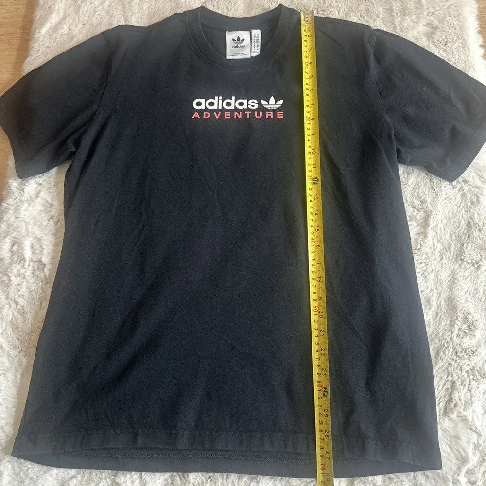Adidas Adventure men's black graphic t-shirt‎ with Trefoil logo on chest.Size M